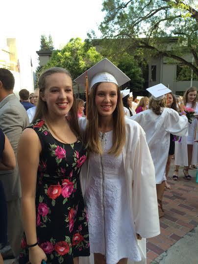 Alumna Jennifer (track) and volleyball junior Kelsey Grover at Jennifer’s graduation. 