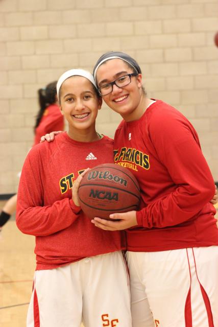 Anna and Rachel Huber played for the freshmen basketball team this season. #NationalSiblingDay #TroubieTakeover