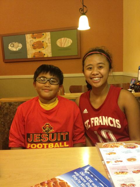 Maryael Ramos is often cheered on by her brother, Mario, at her basketball games. He plays for the Jesuit Junior Marauders.