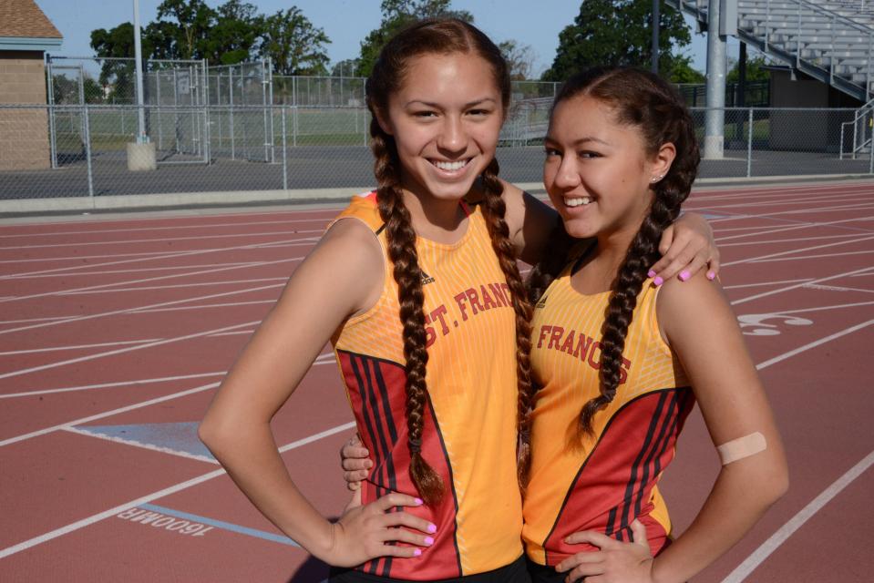 Junior Kiani, who was part of the third-place 4x400-meter relay last year at the state meet, and freshman Alana Reyna both compete for the track and field team. 