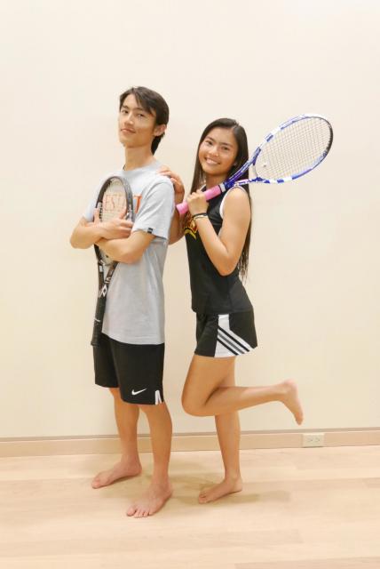 Freshman Marisa Fat, who played tennis and is on the swim team this spring, poses with her brother Michael (Jesuit ‘15). They are both on their respective high school tennis teams.