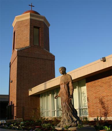 The statue of St. Francis of Assisi that graces the front entrance of the school was created by Adan Romo, local artist and sculpture instructor at St. Francis High School.