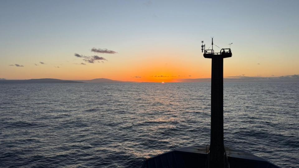 The sun sets over the Pacific Ocean near the Hawaiian Islands.  St. Francis Catholic High School Sacramento, CA