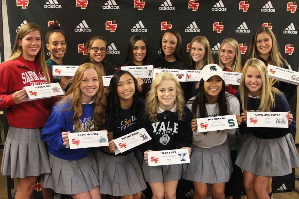 Caption: Thirteen St. Francis Troubadours participated in the National Letter-of-Intent and College Commitment Celebration at St. Francs on Wednesday. Front Row (L to R): Katie McIntee (Swimming, San Jose State), Tiffany Wong (Diving, UC San Diego), Lilly Enes (Track & Field, Yale), Mel Baccay (Softball, Michigan State), Caroline Coyle (Crew, UCLA). Back Row (L to R): Maggie Oys (Water Polo, Santa Clara), Tia Hay (Basketball, Colorado State), Jenna Barthels (Water Polo, Cal-State Northridge), Chloe Mitchell (Swimming, Fordham), Nicole Spring (Track & Field, Brown), Julianna Qvistgaard (Crew, Cal), Julie Zanobini (Water Polo, Loyola Marymount), Ariane Arndt (Track &Field, Cal).